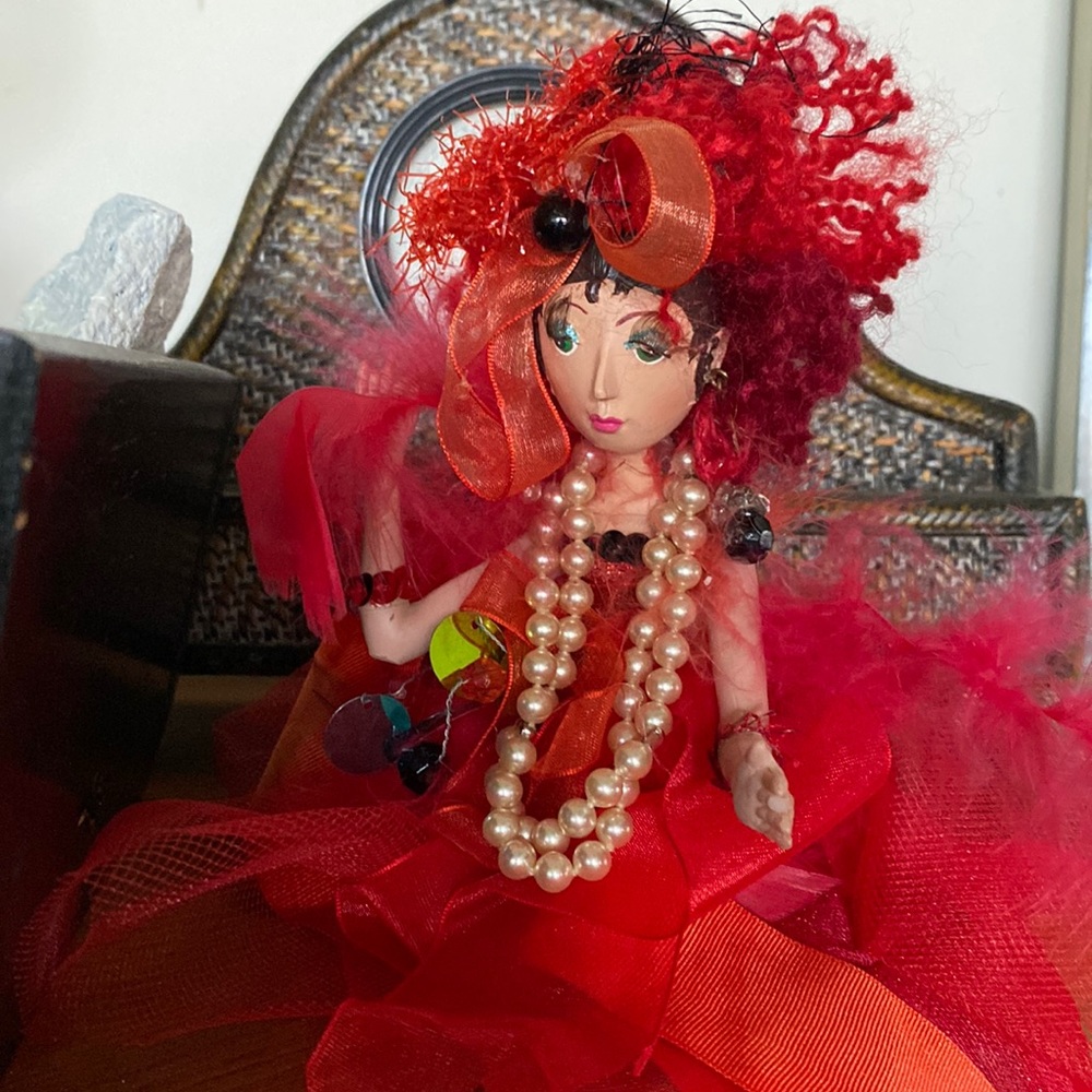 Adorable Red lady figurine
